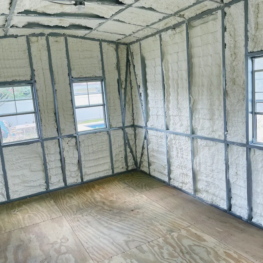Closed-cell spray foam insulation applied to wall cavities in a residential project in Patton